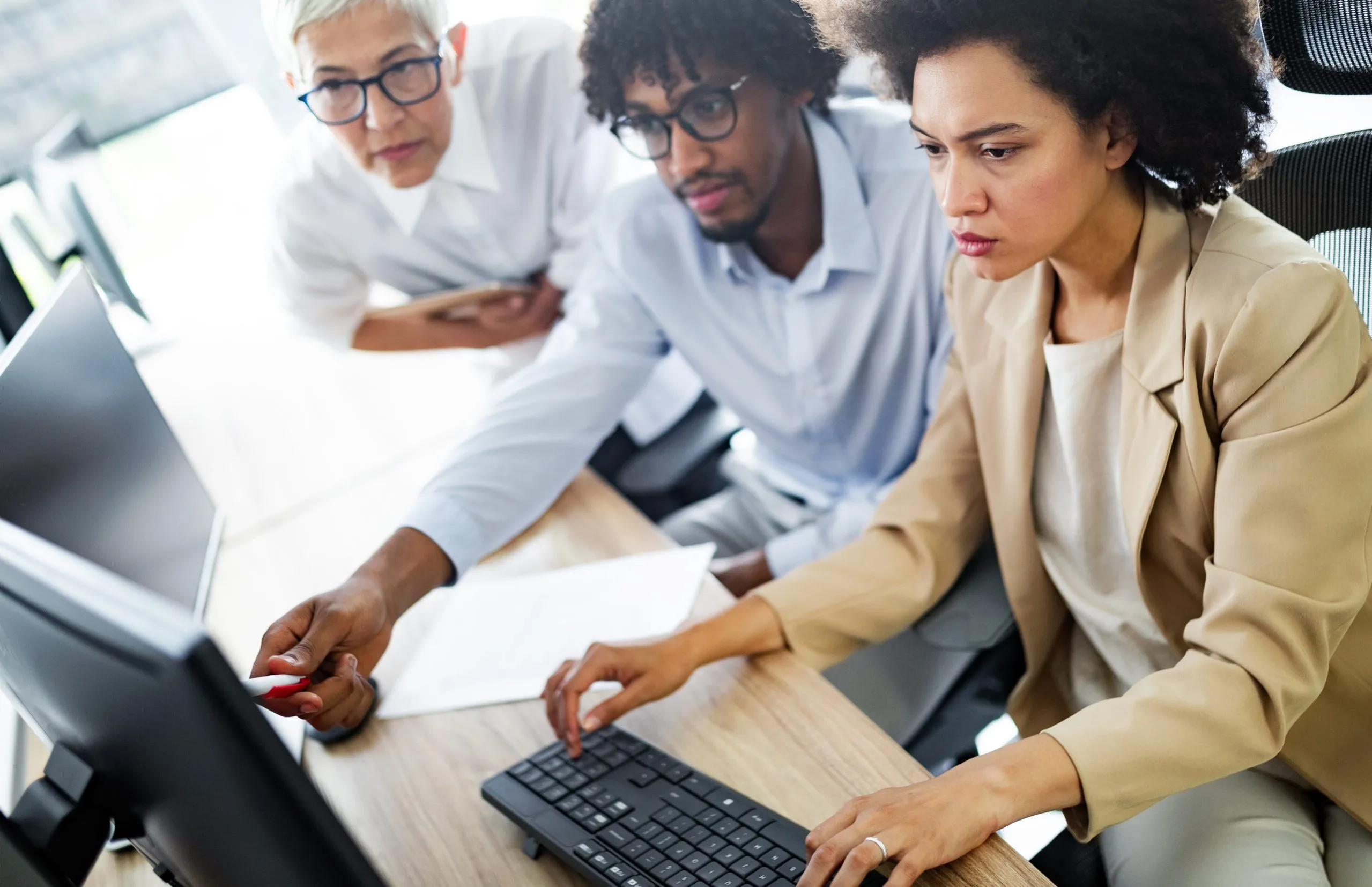 successful-business-group-of-people-at-work-in-off-XPUHYME-scaled